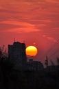 Sunset and red skyes over a hight buildings Royalty Free Stock Photo